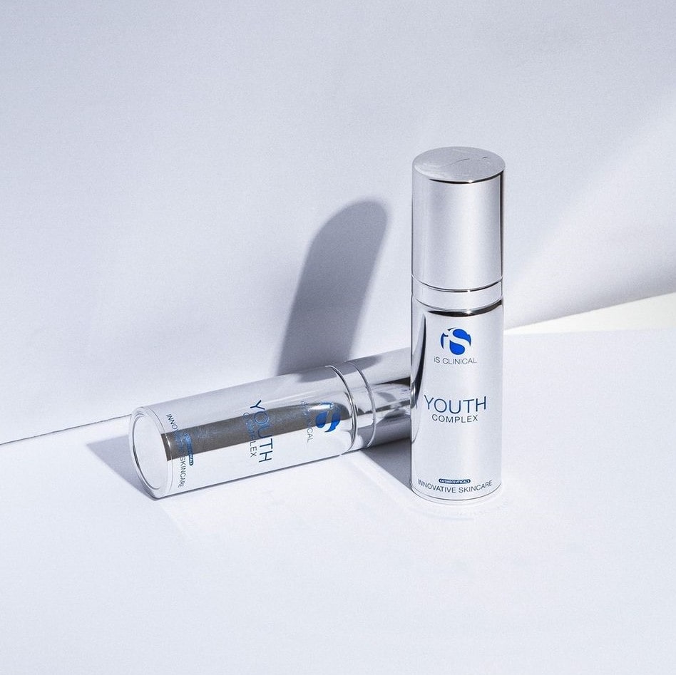 Youth complex is a cosmetic from the is clinic brand in modern metallic gray packaging weighing 30g